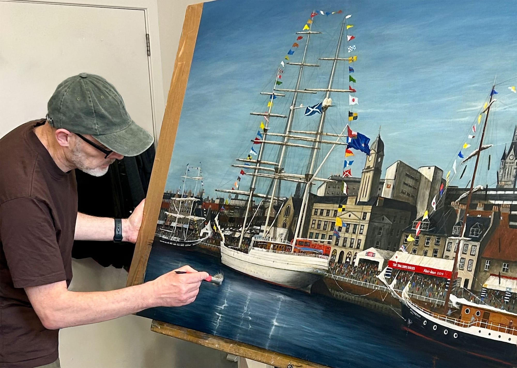 Clive Ramage working on the painting in his studio