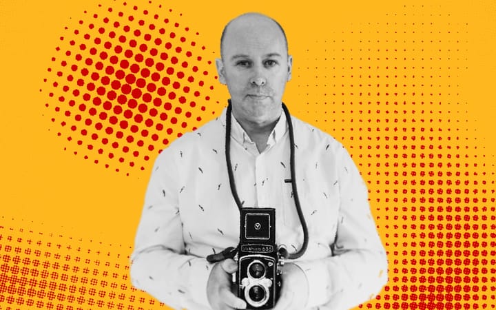 Paul Nicol holding a Yashica 635 twin-lens reflex camera