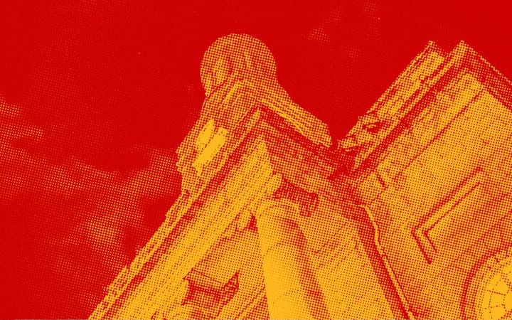 Halftone graphic of a figure standing beside a large angular building, in yellow and red
